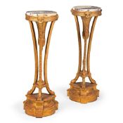 WITHDRAWN A PAIR OF CARVED GILTWOOD AND MARBLE TOPPED TORCHERES