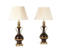 A PAIR OF BRONZED AND GILT MODERATOR TABLE LIGHTS, FRENCH, LATE 19TH CENTURY AND LATER