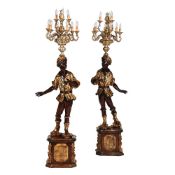 A PAIR OF CARVED AND POLYCHROME DECORATED 'MORETTO' FIGURAL CANDLESTICKS, 20TH CENTURY