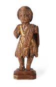 A CARVED GILTWOOD FIGURE OF A CHILD, SPANISH COLONIAL, 17TH CENTURY