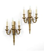 A PAIR OF NAPOLEON III GILT BRONZE THREE BRANCH WALL LIGHTS, CIRCA 1860-1880