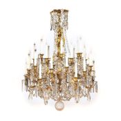 A LARGE CUT GLASS MOUNTED ORMOLU THIRTY LIGHT CHANDELIER, 19TH CENTURY