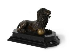 A GILT AND PATINATED BRONZE MODEL OF A LION, GERMANY, 17TH CENTURY
