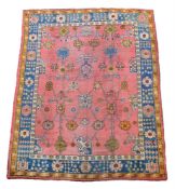 AN USHAK CARPET, approximately 310 x 265cm