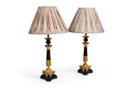 A PAIR OF FRENCH GILT AND PATINATED BRONZE TRIFORM LAMP BASES