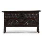 AN UNUSUAL SMALL CHARLES I OAK CARVED CHEST, CIRCA 1630