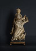 AN ITALIAN PAINTED STUCCO FIGURE OF SAINT JOHN THE EVANGELIST, LATE 17TH OR EARLY 18TH CENTURY