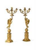 A PAIR OF FRENCH EMPIRE ORMOLU CHERUB CANDELABRA, EARLY 19TH CENTURY
