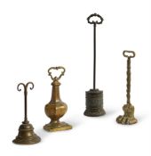 A GROUP OF FOUR BRASS DOOR PORTERS, 19TH CENTURY AND LATER