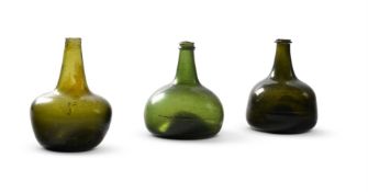 A GROUP OF THREE GLASS WINE BOTTLES, ENGLISH, 17TH AND 18TH CENTURY