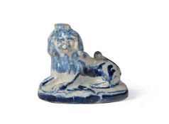 A DUTCH DELFT BLUE AND WHITE LION, 18TH CENTURY