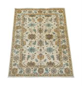 A WOVEN RUG, OF ZIEGLER DESIGN