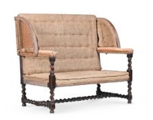 A CHARLES II WALNUT WING BACK SETTEE, CIRCA 1680