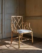 A REGENCY CARVED BEECH AND CREAM PAINTED 'COCKPEN' ARMCHAIR, CIRCA 1815