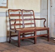 A GEORGE II WALNUT SETTEE, CIRCA 1750