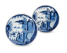 A PAIR OF ENGLISH DELFT BLUE AND WHITE PLATES, 18TH CENTURY