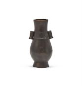 A Chinese small bronze hu vase
