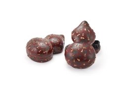 A pair of Chinese large lacquered double-gourd boxes and covers