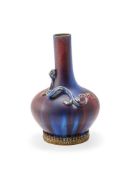 A Chinese moulded 'Chilong dragon' flambe vase