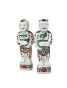 A pair of Chinese 'wucai' figures of boys
