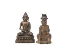 A Chinese bronze seated scholar