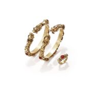 Two carnelian mounted gold coloured 'dragon' bracelets