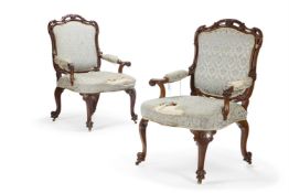 A PAIR OF GEORGE III MAHOGANY ARMCHAIRS ATTRIBUTED TO WILLIAM AND RICHARD GOMM
