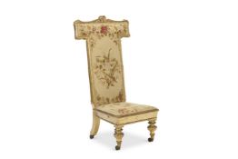 A VICTORIAN GILTWOOD AND FLORAL NEEDLEWORK UPHOLSTERED PRIE-DIEU, MID 19TH CENTURY