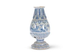 A DUTCH DELFT BLUE AND WHITE CHINOISERIE CISTERN OF BALUSTER FORM, EARLY 18TH CENTURY