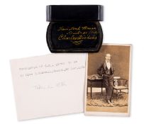 Dickens (Charles).- Lacquered papier-mâché snuff box, gift inscription 