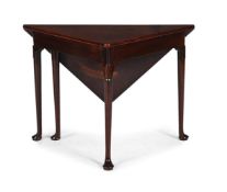 AN UNUSUAL GEORGE II MAHOGANY TRIANGULAR DROP LEAF TABLE, CIRCA 1740