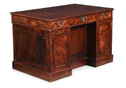 A GEORGE III MAHOGANY DESK, IN THE MANNER OF THOMAS CHIPPENDALE, CIRCA 1790