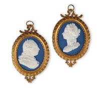 A PAIR OF WEDGWOOD & BENTLEY PALE-BLUE SOLID JASPER OVAL PLAQUES