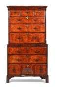 A FINE GEORGE II FIGURED WALNUT CHEST ON CHEST, CIRCA 1730
