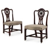 A PAIR OF GEORGE III MAHOGANY WHEEL BACK CHAIRS, ATTRIBUTED TO GILLOWS, CIRCA 1780