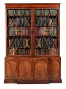 A GEORGE III MAHOGANY BREAKFRONT BOOKCASE, CIRCA 1800