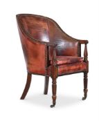 A GEORGE III MAHOGANY AND LEATHER UPHOLSTERED LIBRARY ARMCHAIR, ATTRIBUTED TO GILLOWS, CIRCA 1800