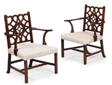 A PAIR OF GEORGE II MAHOGANY OPEN ARMCHAIRS, IN THE MANNER OF ROBERT MANWARING, CIRCA 1750