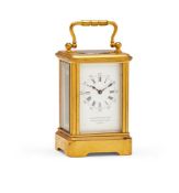 A FRENCH GILT BRASS MINIATURE CARRIAGE TIMEPIECE