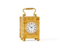 AN UNUSUAL LATE VICTORIAN AESTHETIC MOVEMENT SILVER-GILT CARRIAGE TIMEPIECE