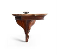 A GEORGE III MAHOGANY CLOCK BRACKET