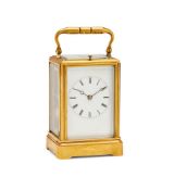 A FRENCH GILT BRASS CARRIAGE CLOCK WITH PUSH-BUTTON REPEAT AND ONE-PIECE CASE