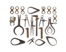 A GROUP OF EIGHT BRASS WHEEL POISING TOOLS AND A COLLECTION OF VARIOUS CALIPERS