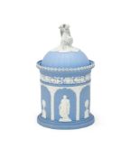 A WEDGWOOD SOLID-BLUE JASPER CYLINDRICAL JAR AND DOMED COVER 'THE TEMPLE OF FLORA'LATE 18TH CENTURY