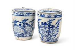 A PAIR OF BLUE AND WHITE TIN-GLAZED EARTHENWARE LIDDED STORAGE JARS, LATE 19TH CENTURY