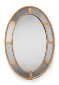 A GEORGE III CARVED GILTWOOD LARGE OVAL MARGINAL MIRROR, CIRCA 1780