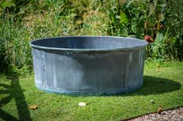 A VERY LARGE VERDIGRIS COPPER AND RIVETED PLANTER, CONTEMPORARY