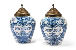A PAIR OF DELFT TOBACCO JARS AND BRASS COVERS, 19TH CENTURY
