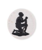 A WEDGWOOD WHITE DRY-BODIED STONEWARE AND DARK-BROWN JASPER ANTI-SLAVERY MEDALLION