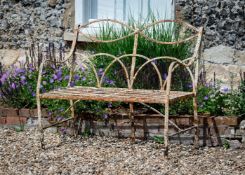 A REGENCY REEDED STRAPWORK BENCH, CIRCA 1820